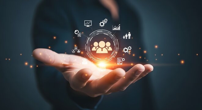 Hand holding glowing digital network of people and business icons