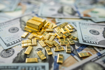 Golden bullion and US dollar bills representing stability, capital growth, and financial prosperity