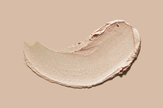 Beige liquid creamy stick highlighter or bronzer luminous simmer glitter eye shadow, foundation glossy finish, highlighter texture