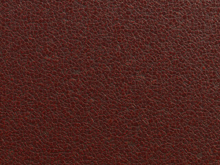Fototapeta premium Close-up of a smooth, dark leather texture with a slightly worn, rich tone.