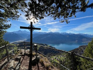 The Bira rock or viewpoint on the alpine cliff above Lake Turn and in the Bernese Oberland region,...