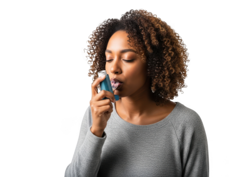 Young african american woman using an inhaler for respiratory relief with her eyes closed isolated on transparent background - Powered by Adobe