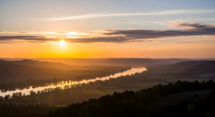Majestic river valley panorama at golden hour, a winding waterway through serene hills and mist, illuminated by breathtaking sunrise or sunset