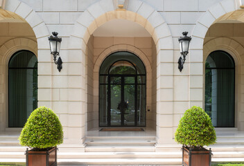 Elegant arched entrance of a luxury classical building