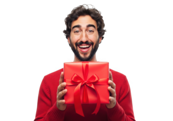 Joyful man with beard wearing a red sweater holding a bright red gift box tied with a satin ribbon isolated on transparent background