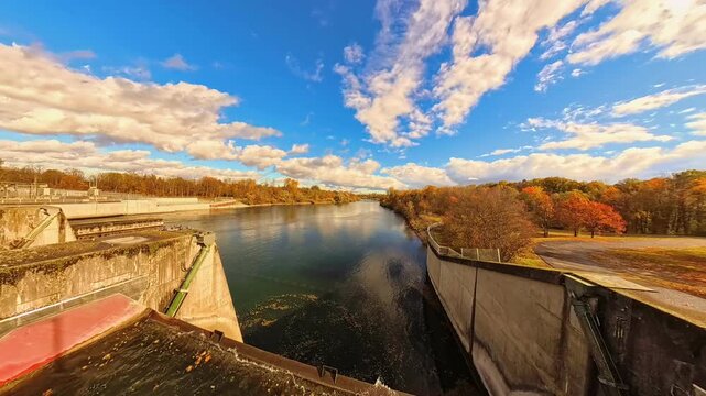 4K Timelapse video with moving clouds and reflections near sunset or sundowner at Zulling, Landau, river Isar, Dingolfing, Bavaria, Germany