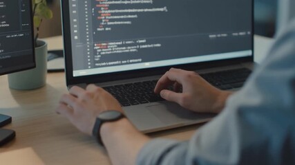 businessman working on computer Close-up view of hands of unrecognisable professional programmer writing code on laptop - Powered by Adobe