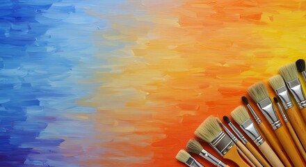 Artistic background of colorful painted texture with paintbrushes on side