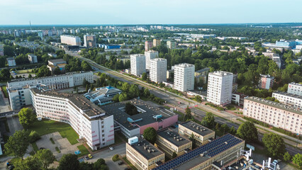 City road intersection near apartment buildings