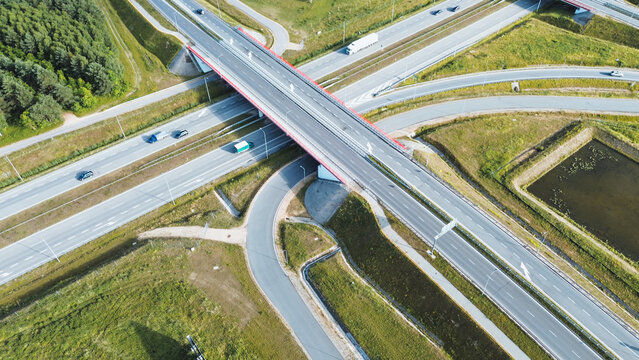 Vehicles crossing busy road interchange