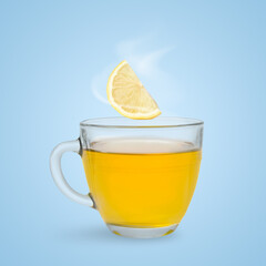 Citrus drink for health boosting. Lemon piece falling into cup on light blue background. Cold season remedy