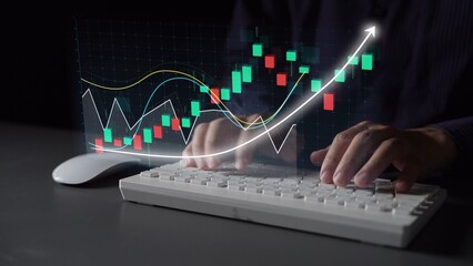A focused view of hands typing on a keyboard, with dynamic financial graphs and upward trends projected in the background, symbolizing investment growth and market analysis. Copula