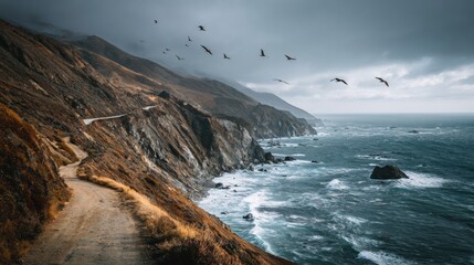 Obraz premium Scenic Cliffside Coastal Road with Waves Crashing Below and Seagulls Flying Overhead at Dusk