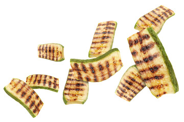Grilled pieces of zucchini flying in air on white background