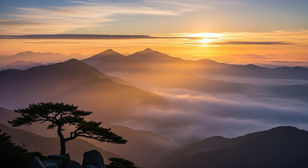 golden sunrise illuminating misty mountains, peaceful natural light theme