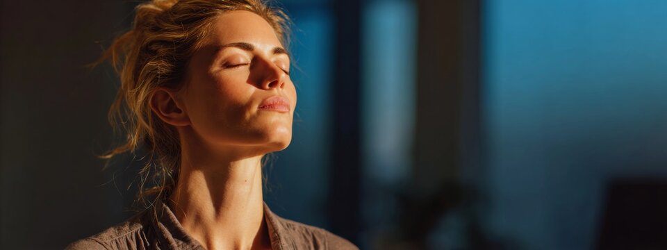 Woman Practicing Relaxation Breathing Techniques to Alleviate Tension in a Calm Indoor Setting