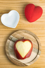 Detail of apple with carved heart