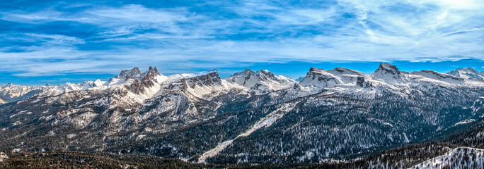 Panoramic view of the Dolomites range from a snowy ski slope in Cortina d&rsquo;Ampezzo, Italy