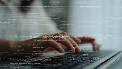 Close-up view of hands typing on a laptop keyboard, with a digital code overlay symbolizing software development and programming in a modern workspace. Xenic