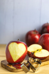 Macro detail of apple carved into a heart shape