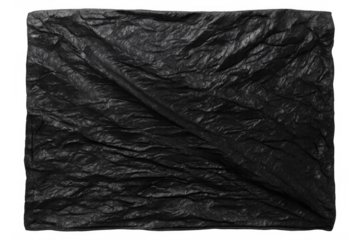 Crumpled dark opaque fabric displaying an abstract black texture with deep folds and deep shadows, isolated on a transparent background