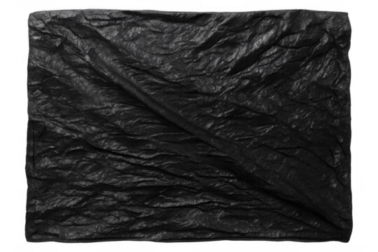 Crumpled dark opaque fabric displaying an abstract black texture with deep folds and deep shadows, isolated on a transparent background