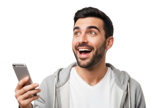A delighted young man with a beard holds a smartphone and looks upwards with an excited expression isolated on transparent background