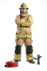 Portrait of firefighter in full turnout gear stands confidently