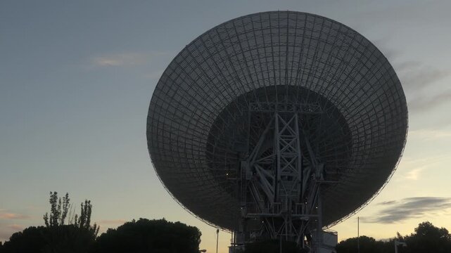 Satelite antenna moving at dusk