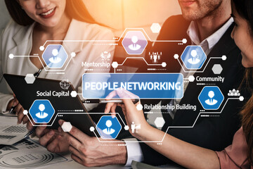 A diverse group of professionals engage in networking, showcasing the importance of mentorship, community, and relationship building in advancing careers and businesses. Tessel