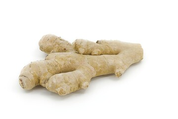 Whole ginger root photographed on bright white background.