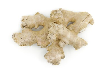 Raw ginger root on white background highlighting its earthy texture.