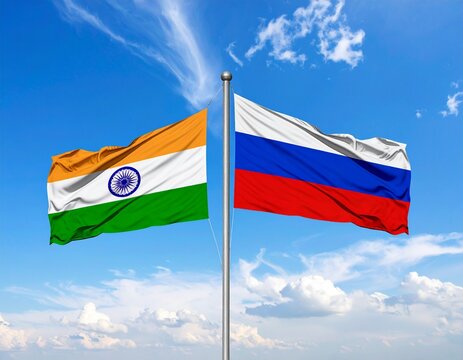 Waving Flags of India and Russia Together on Flagpoles Under a Blue Sky - Powered by Adobe