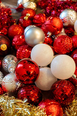festive ornament details, brightly colored spherical decorations with gleaming and textured finishes