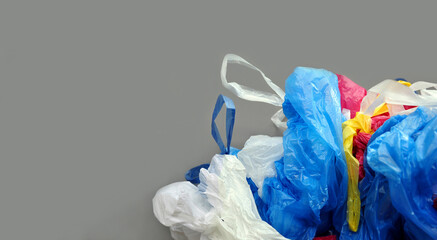 Empty colorful garbage bags. Garbage sorting, waste management concept. Copy space. Abstract...