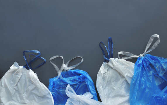 Empty colorful garbage bags. Garbage sorting, waste management concept. Copy space. Abstract colorful garbage bag wallpaper