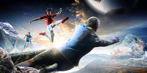 Soccer players in action high in the mountains on the edge of a cliff. Sports concept. Extreme sports moment. Panorama. Cliff. Football players.