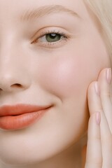 Obraz premium Stunning close-up of a woman's flawless skin and gentle smile, showcasing natural beauty and a touch of radiant blush