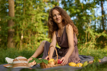 Woman appreciates serene picnic surrounded by natural beauty
