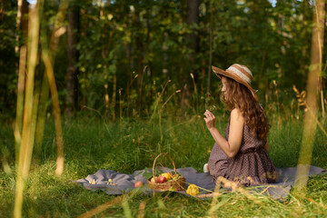 Calm image showing woman resting with apple in tranquil woods