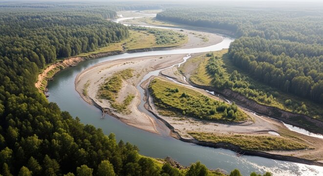 Aerial view of winding river surrounded by lush green forest and riverbanks erosion - Powered by Adobe