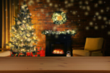 Empty wooden table against blurred room with Christmas tree, bokeh lights. Space for design