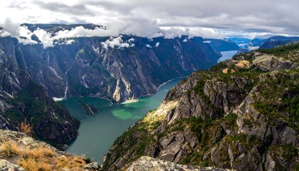 Aerial view of river flowing through rocky canyon