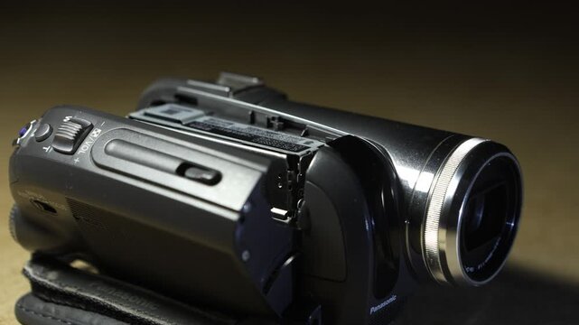 removing a mini-cassette into an old mini-dv camcorder