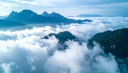 Misty mountain peaks surrounded by clouds