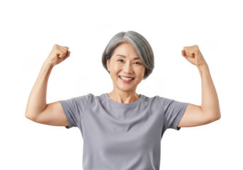 Joyful asian woman flexing biceps showing strength and vitality with a bright smile isolated on transparent background