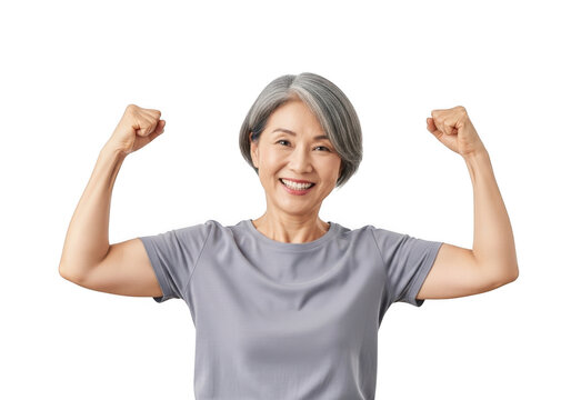 Joyful asian woman flexing biceps showing strength and vitality with a bright smile isolated on transparent background