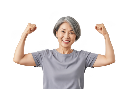 Joyful asian woman flexing biceps showing strength and vitality with a bright smile isolated on transparent background