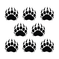 Fototapeta premium Bear paw prints illustration set, generic black wilderness claw symbols representing strength power and outdoor adventure themes.