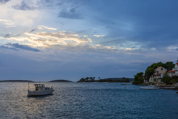 Serene Coastal Scene With Boats, Calm Water, and Historic Village Shoreline at Dusk, Maslinica, Croatia